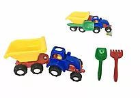 Traktor med henger og sandleker